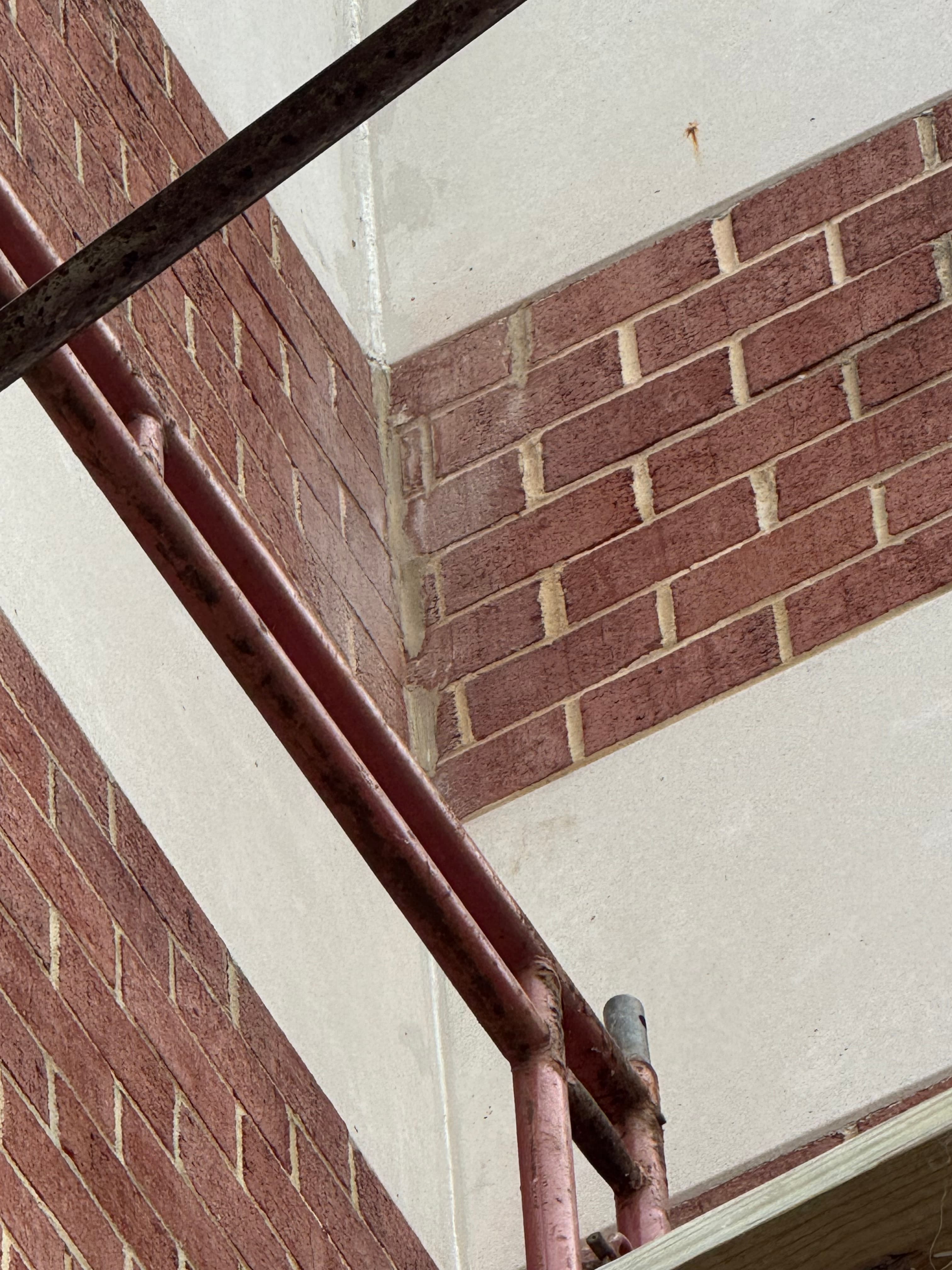 Commercial brick building corner detail with structural steel beam in DC by Atlantic Construction