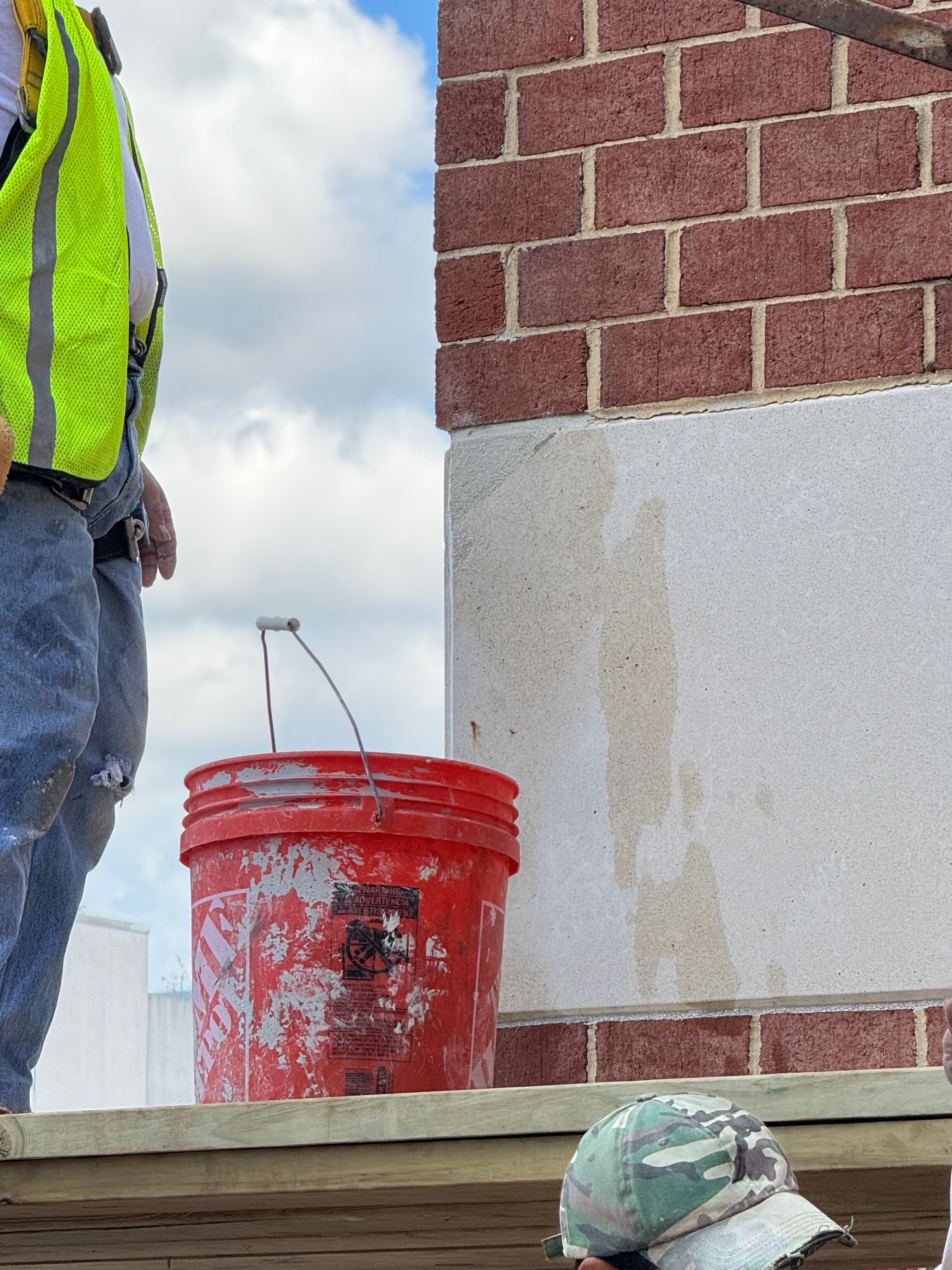 Commercial brick parapet masonry work in progress in DC by Atlantic Construction
