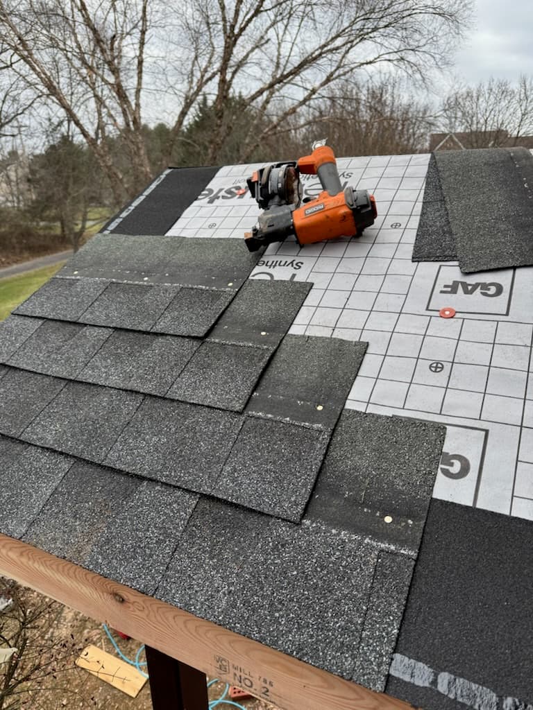 Residential roofing installation with asphalt shingles in Maryland by Atlantic Construction