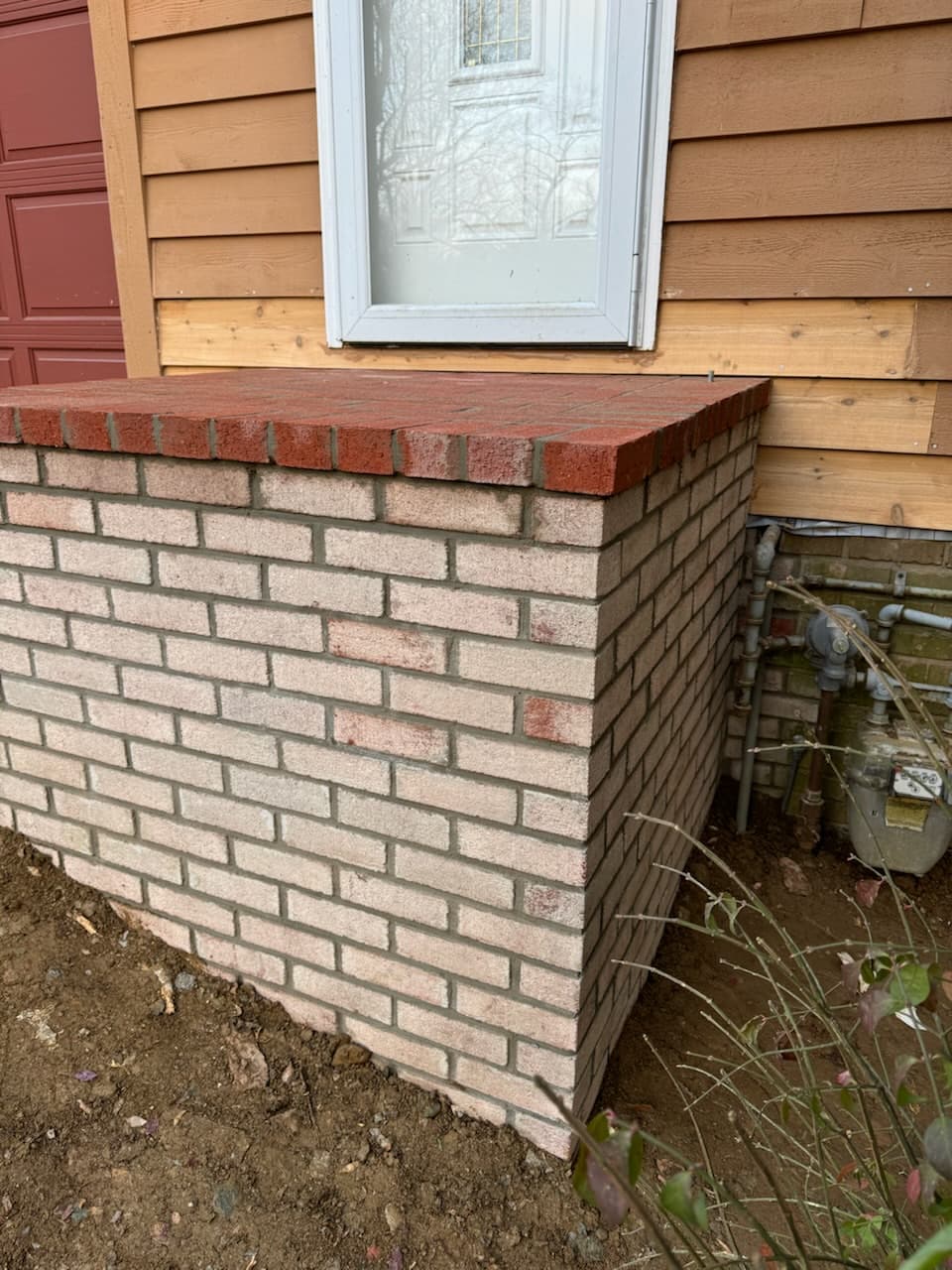 Brick foundation and masonry work in progress in Maryland by Atlantic Construction