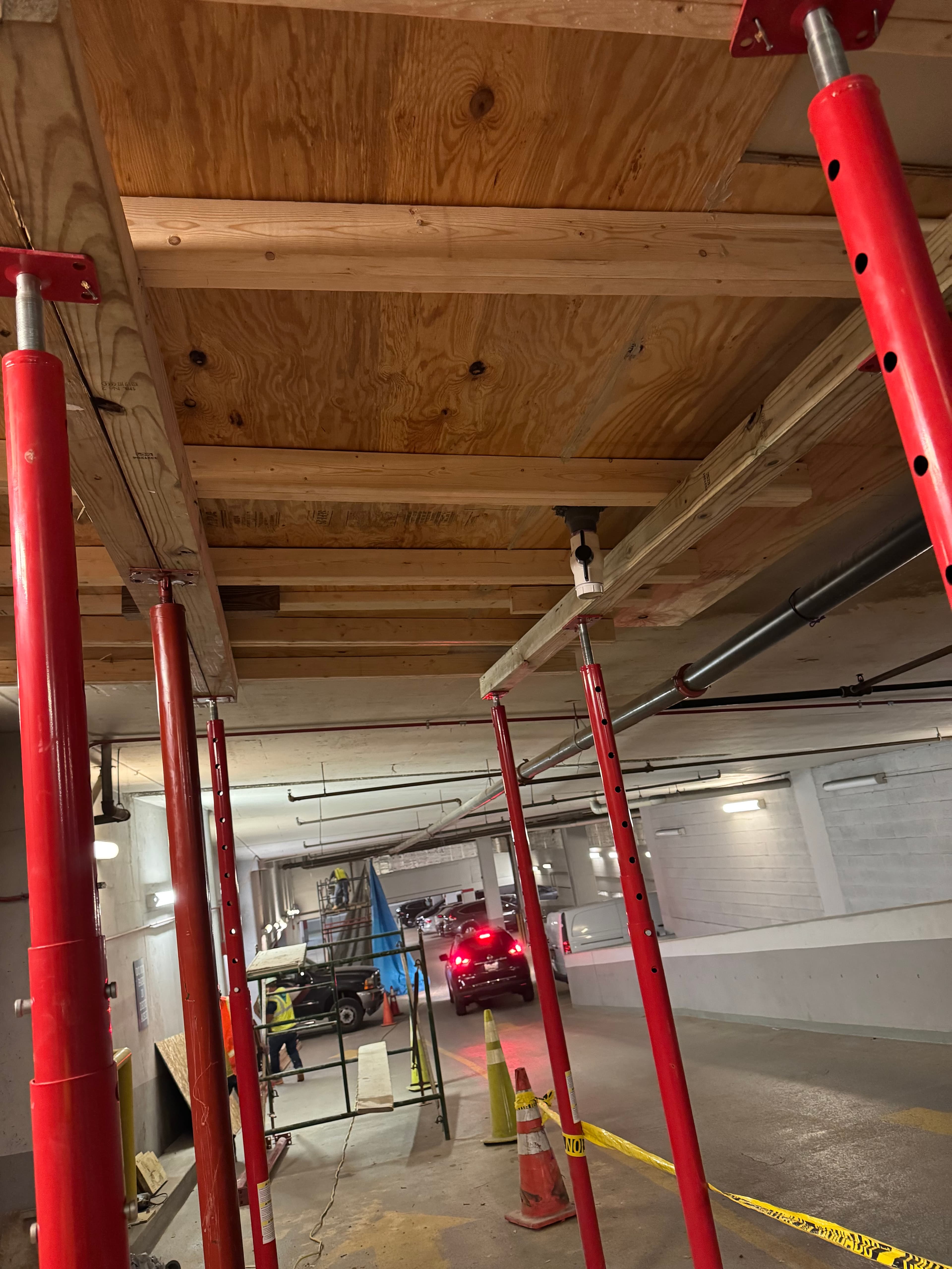 Commercial parking garage wood beam framing installation in DC by Atlantic Construction